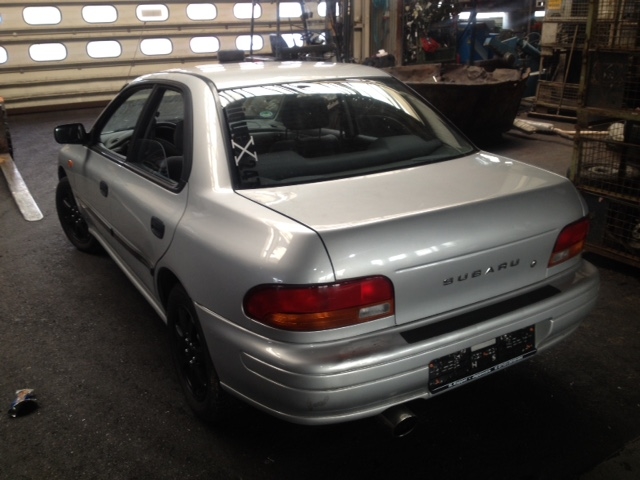 57260FA030 Петля капота Subaru Impreza (G10) 1993-2000 1995