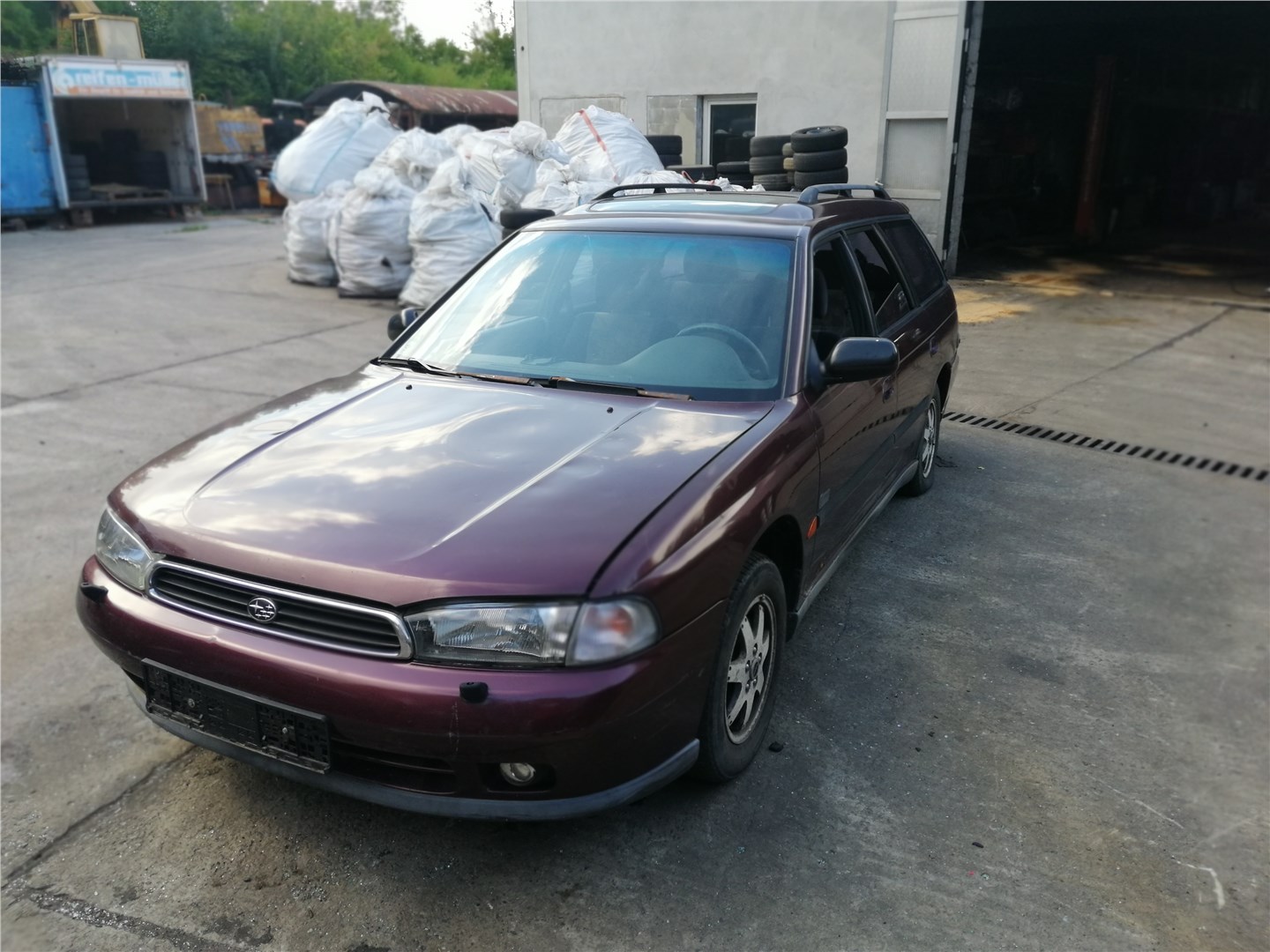 57260AC000 Петля капота Subaru Legacy (B11) 1994-1998 1996