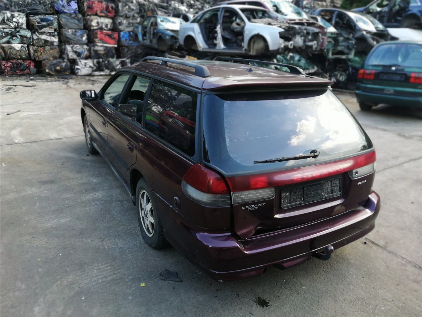 57260AC010 Петля капота Subaru Legacy (B11) 1994-1998 1996