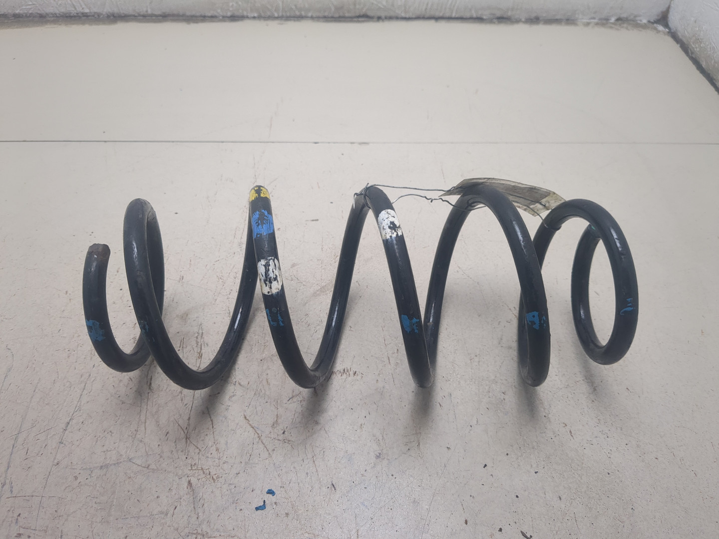 Пружина задняя