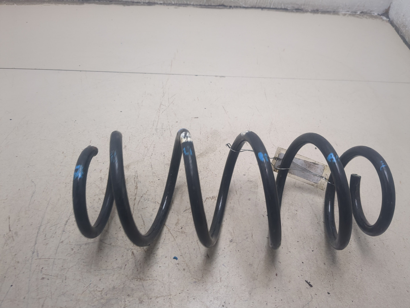 Пружина задняя