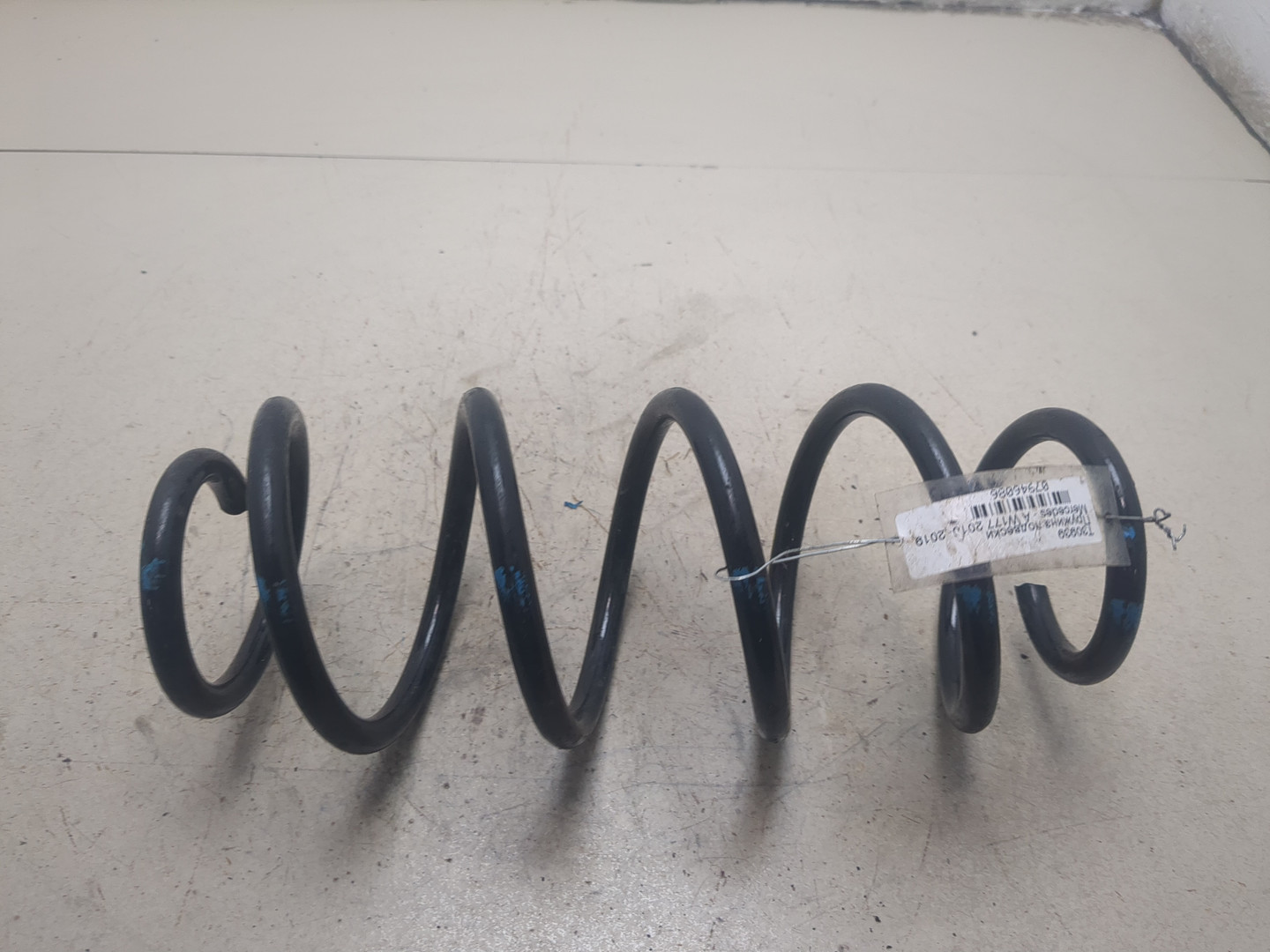 Пружина задняя