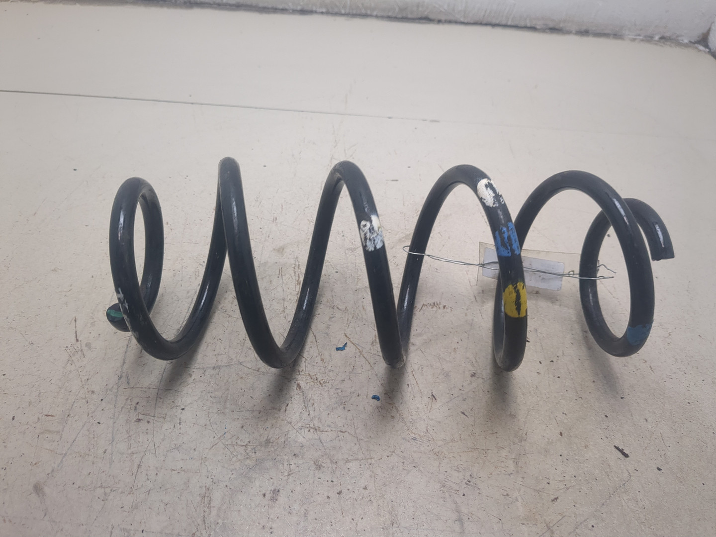 Пружина задняя