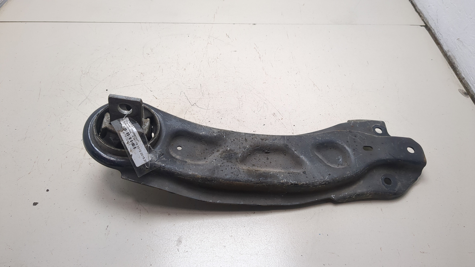 Рычаг задний левый