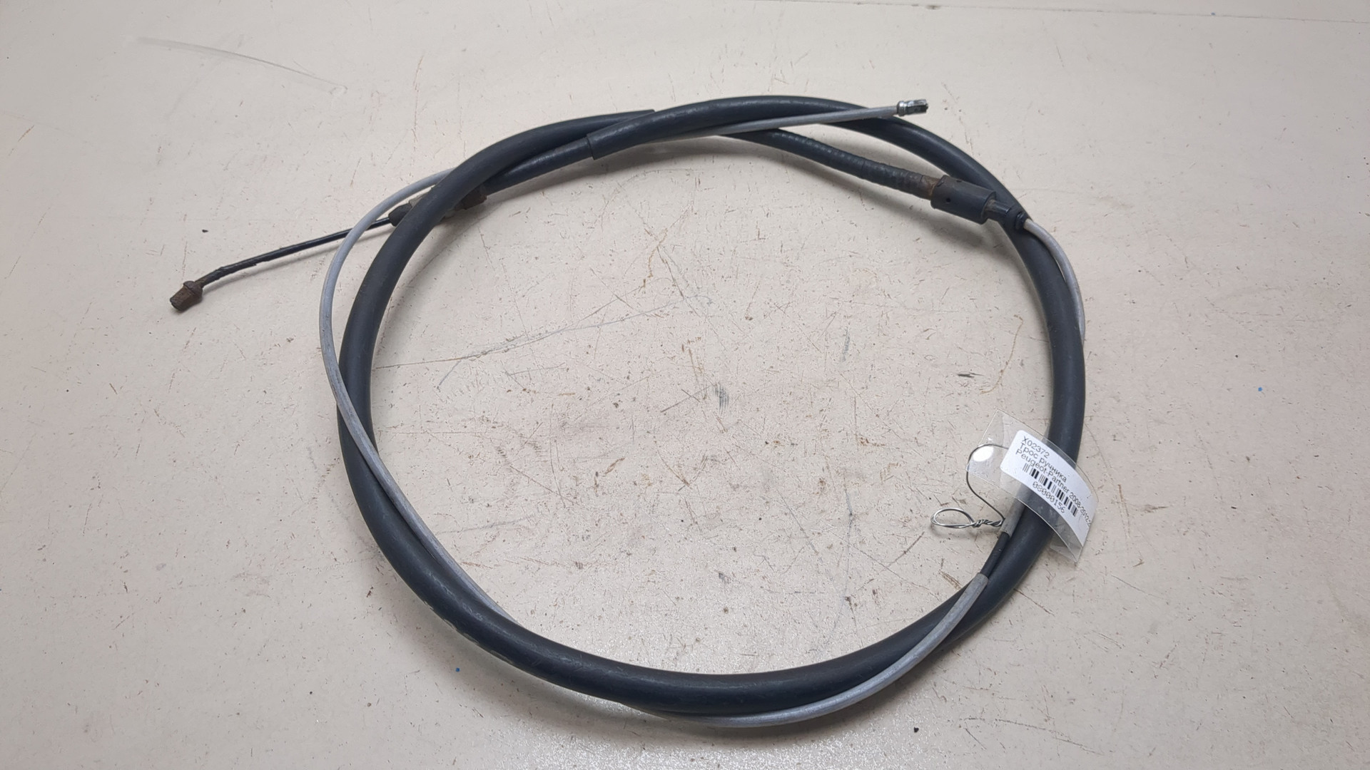 Трос стояночного тормоза