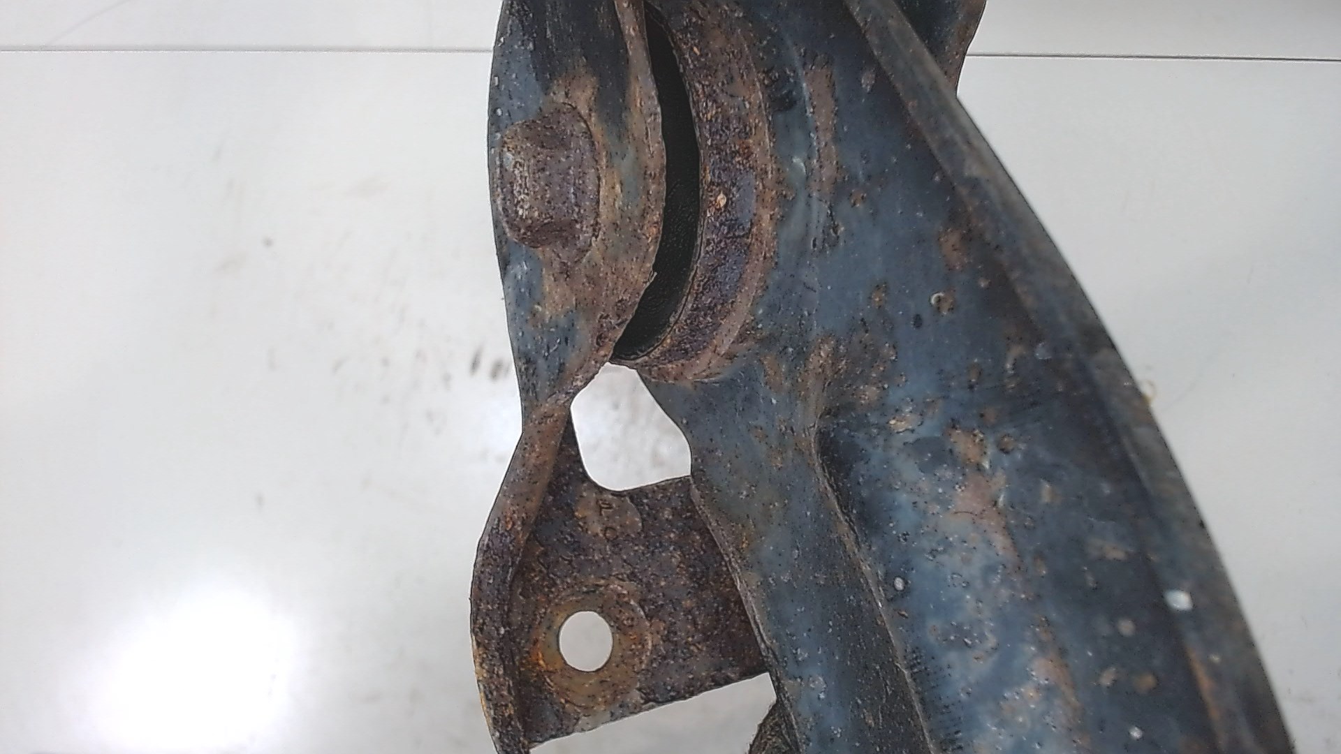 Рычаг задний левый