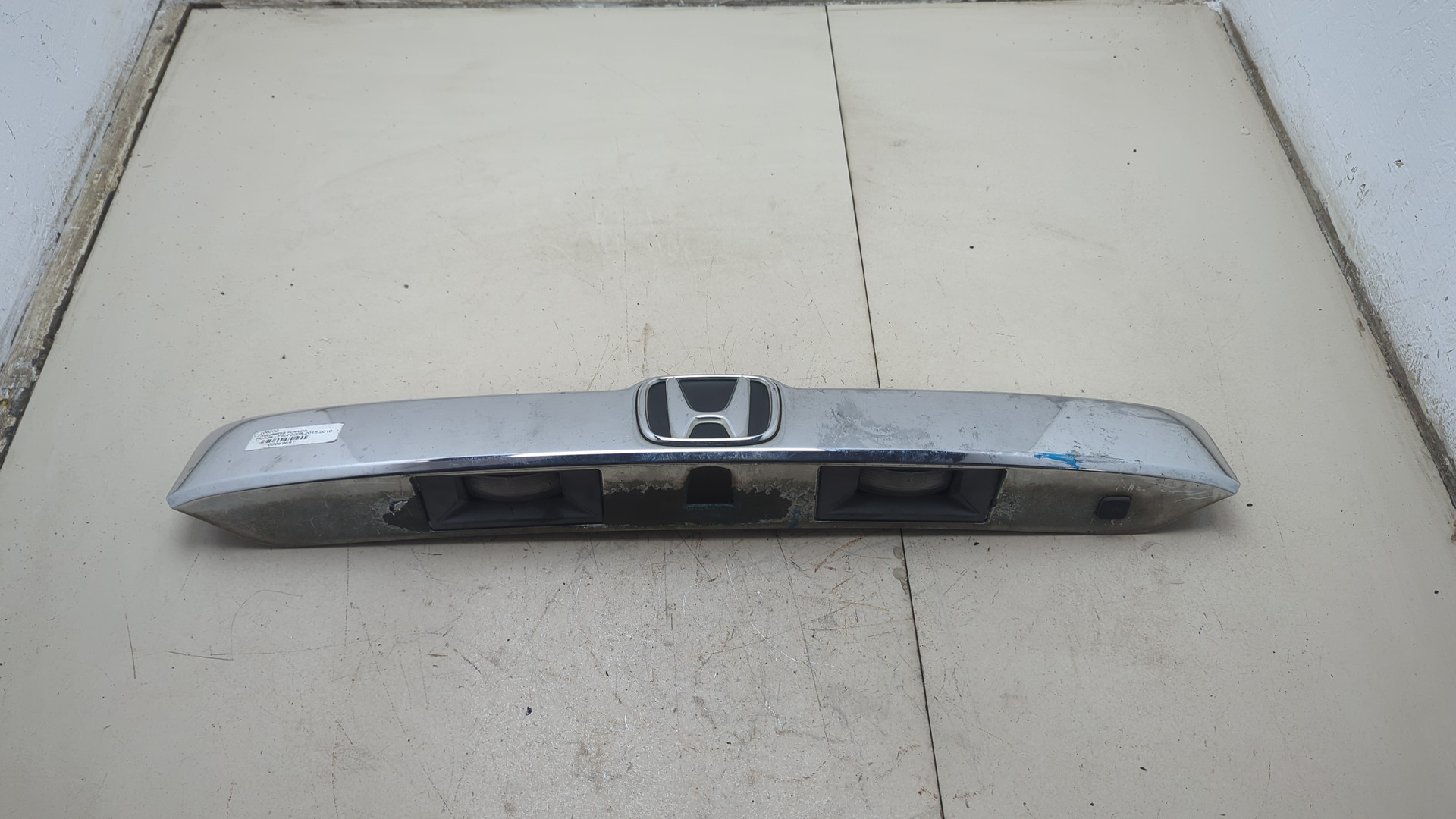 Фонарь подсветки номера