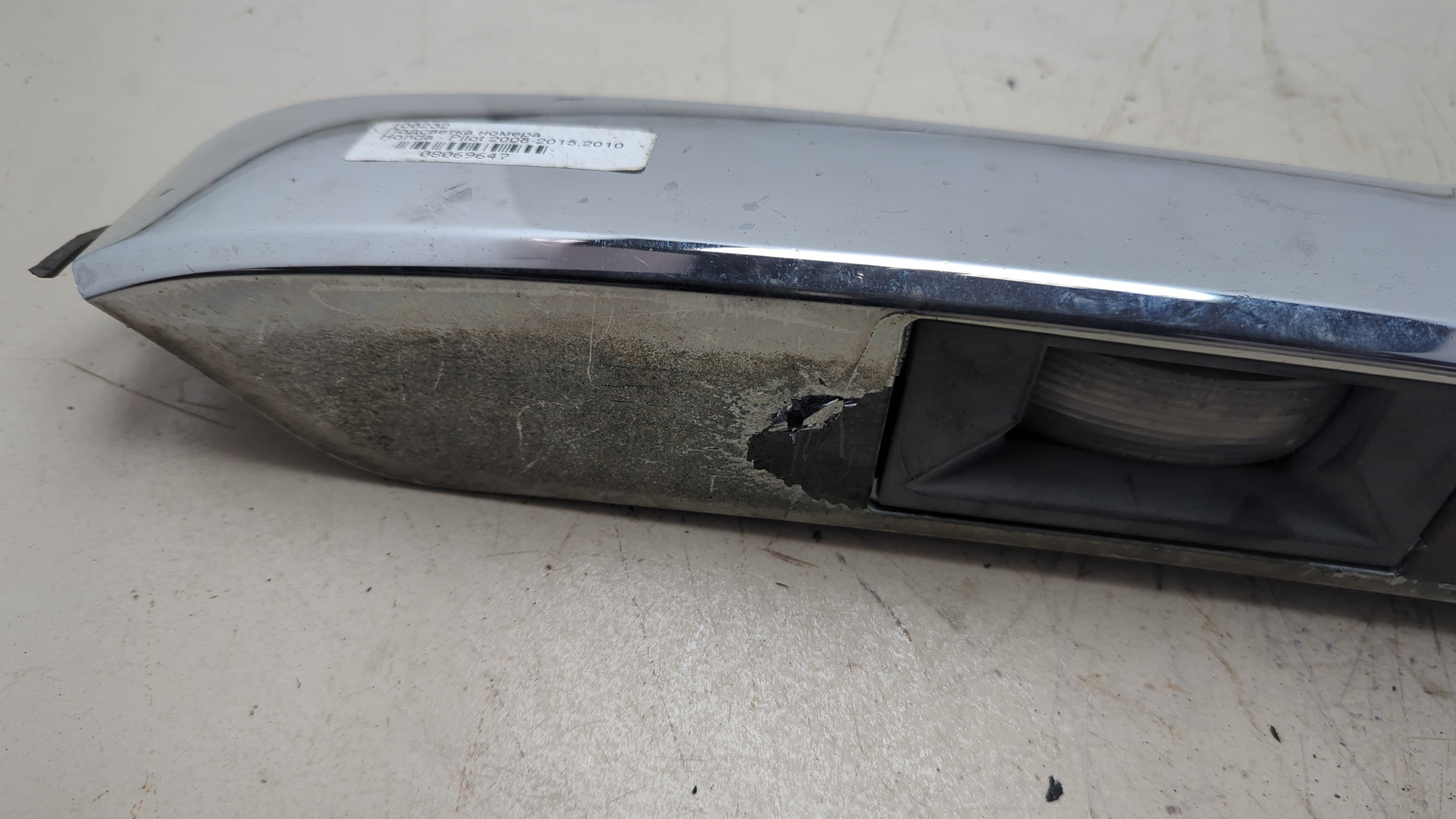 Фонарь подсветки номера