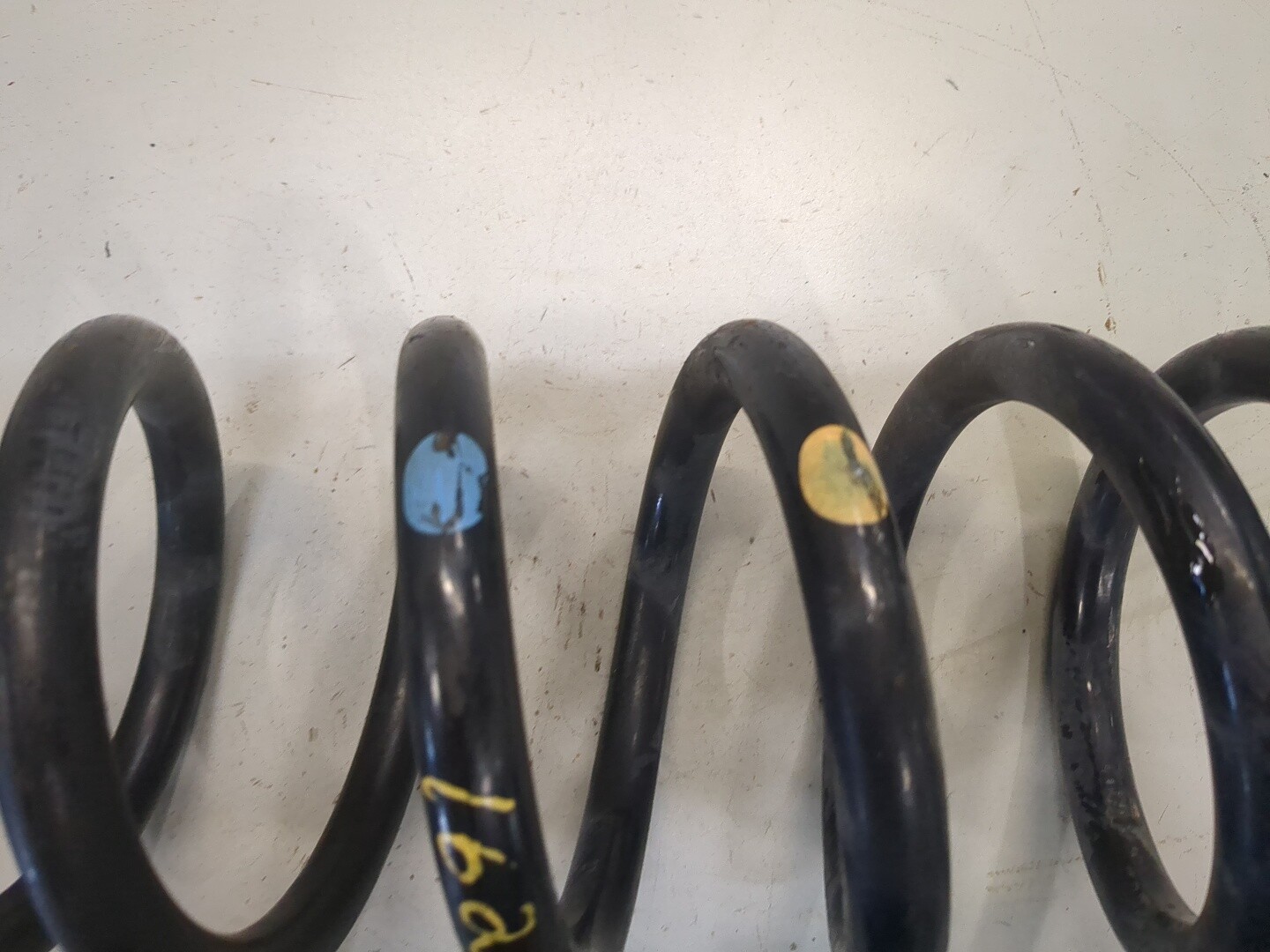 Пружина задняя