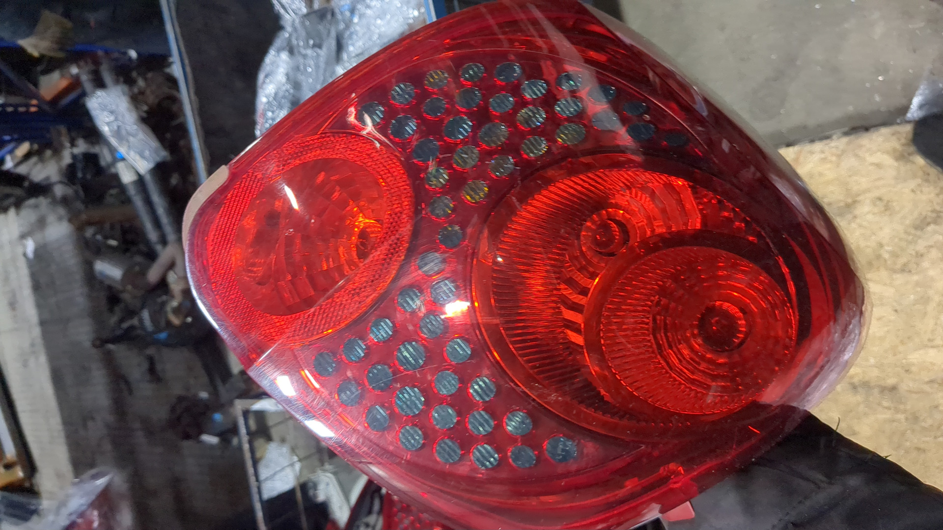 Фонарь задний левый