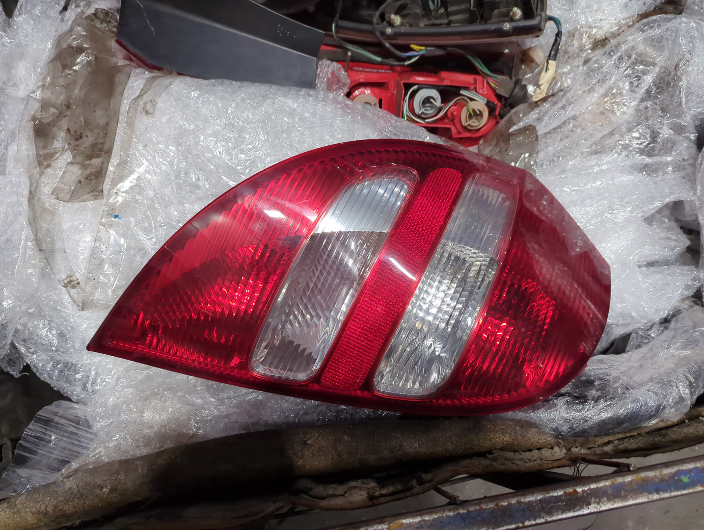 Фонарь задний левый