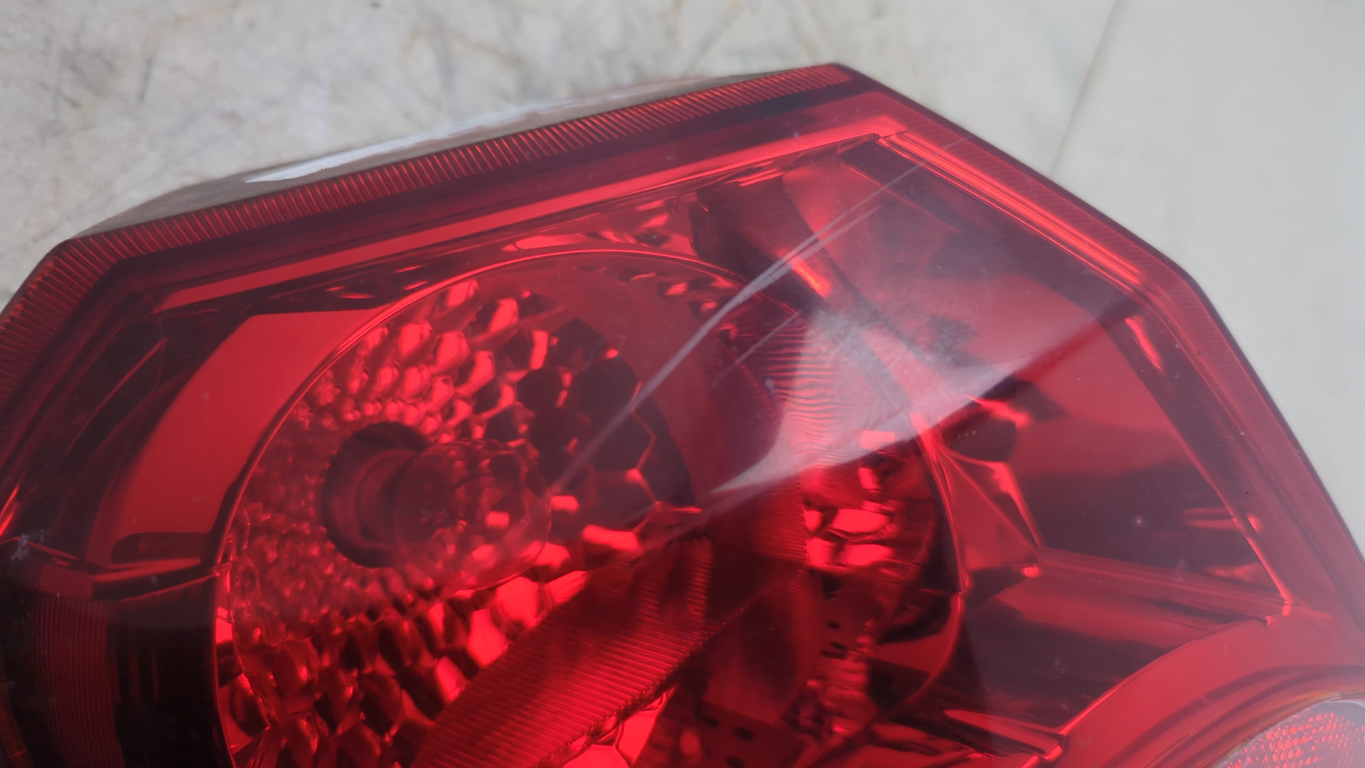 Фонарь задний левый