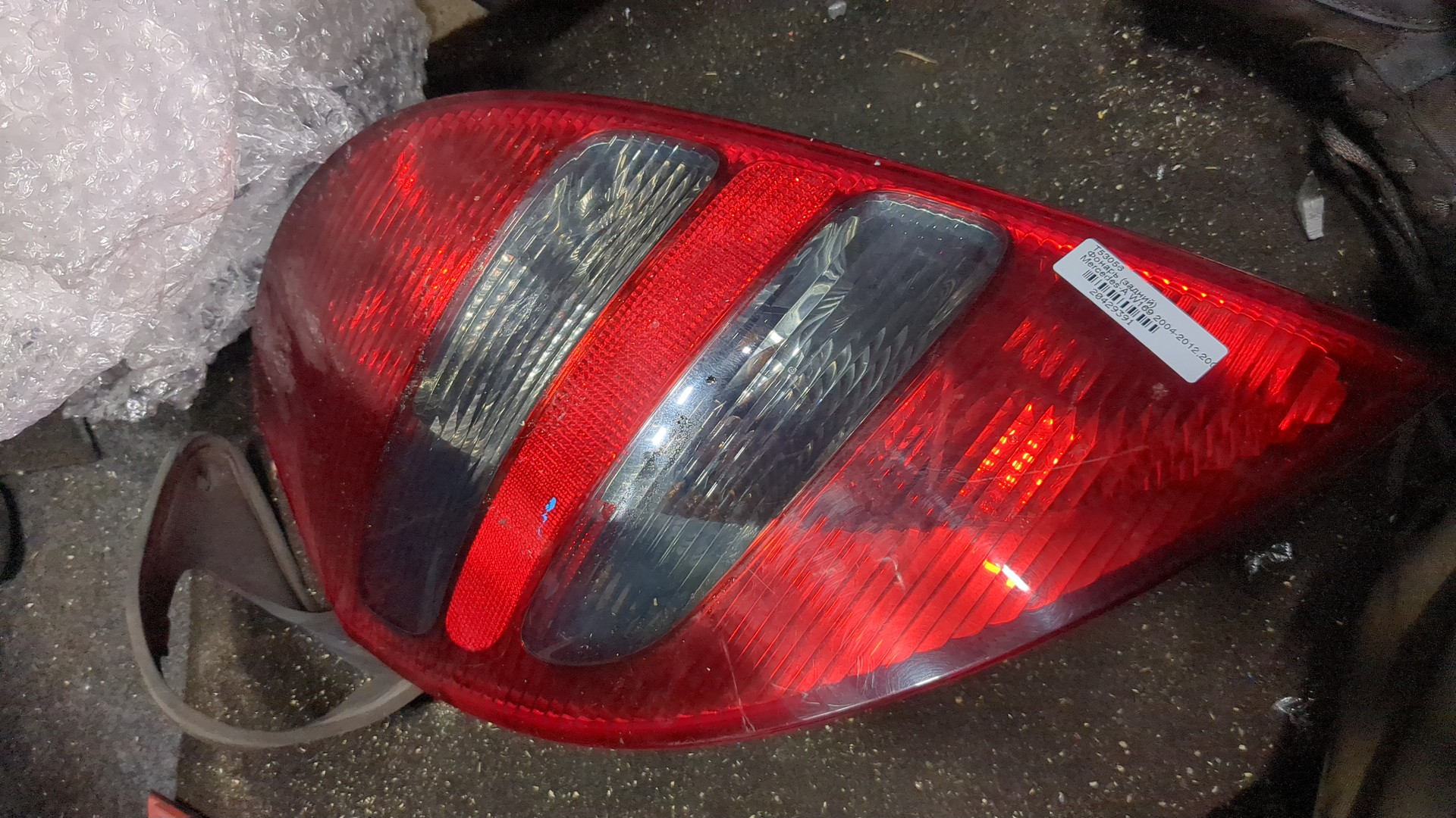 Фонарь задний левый