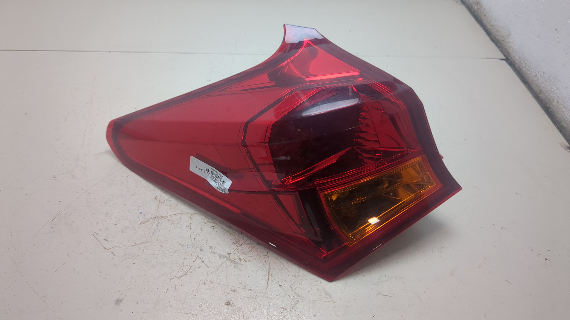 Фонарь задний левый