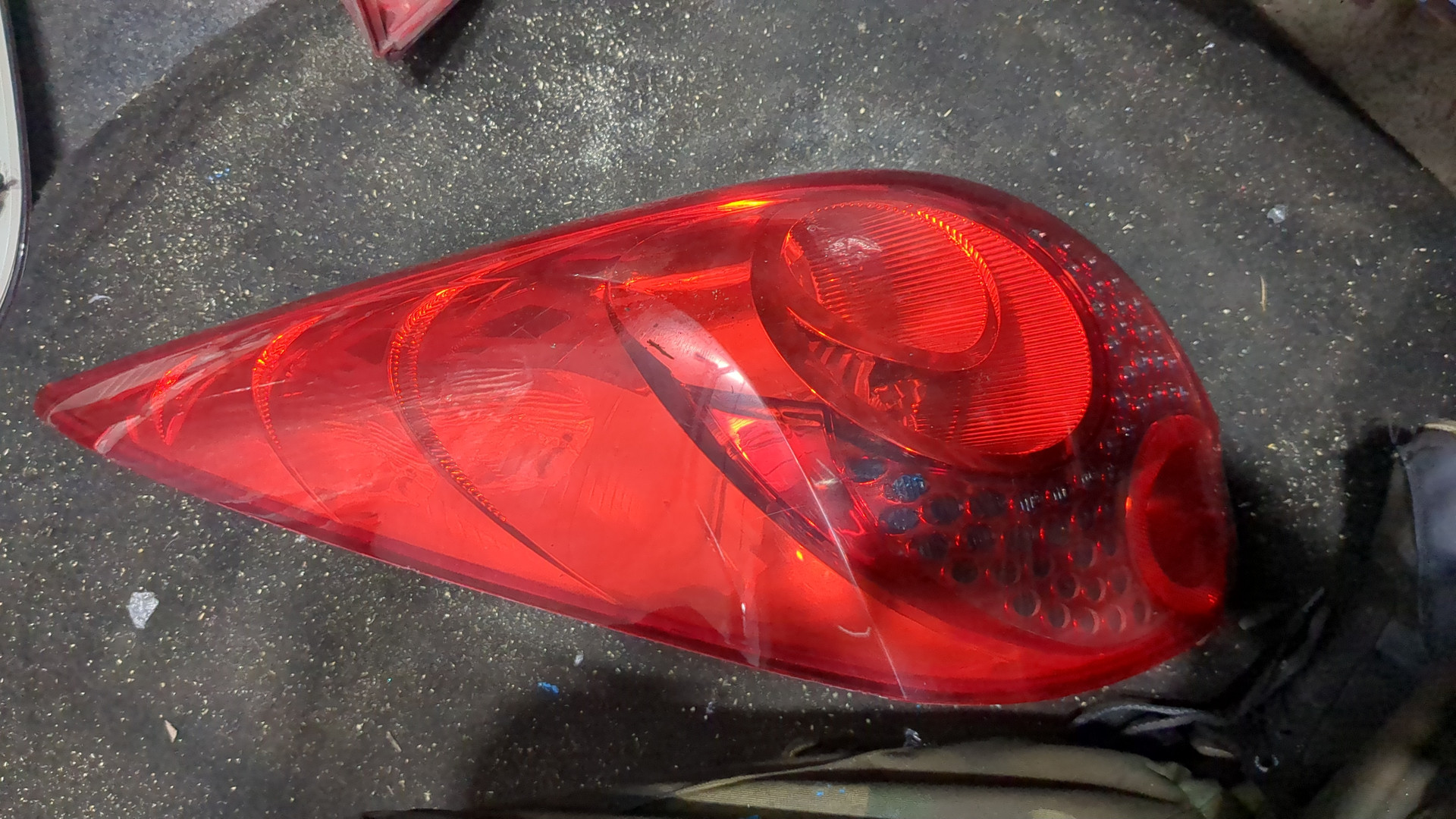 Фонарь задний левый