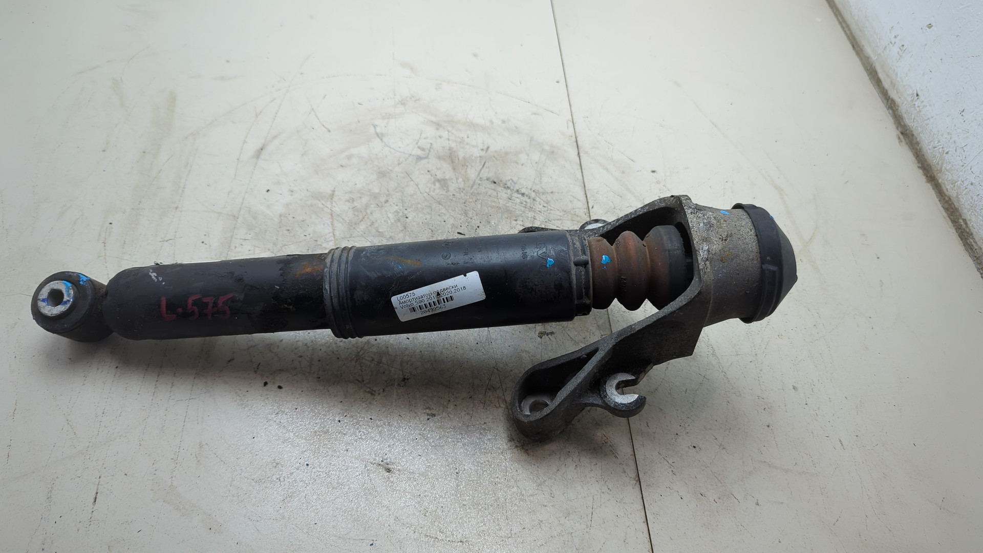 Амортизатор задний левый