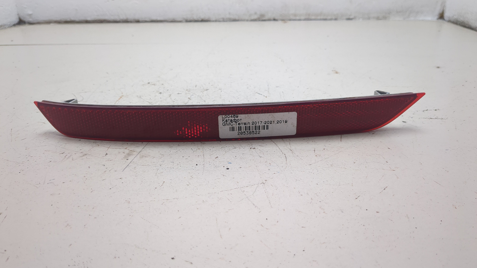 Отражатель в бампер задний левый