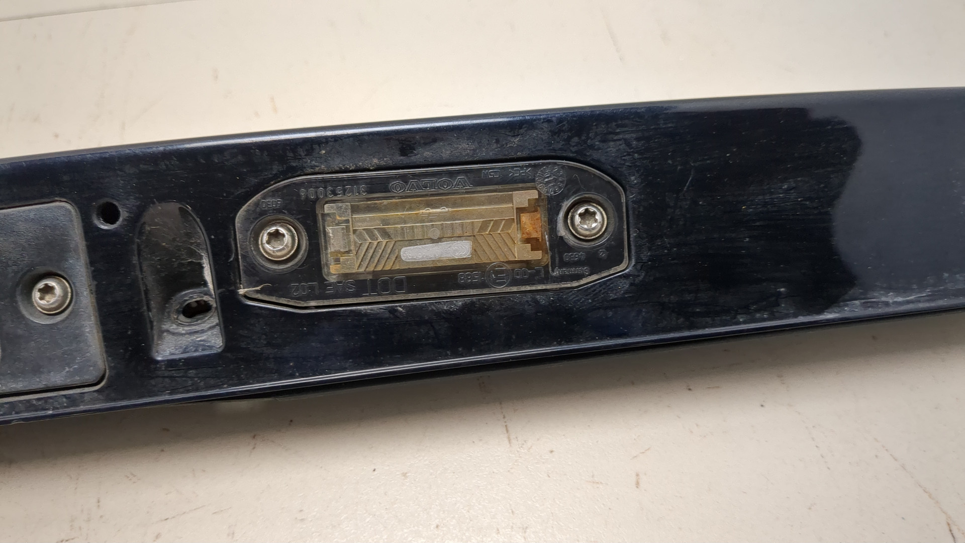 Фонарь подсветки номера