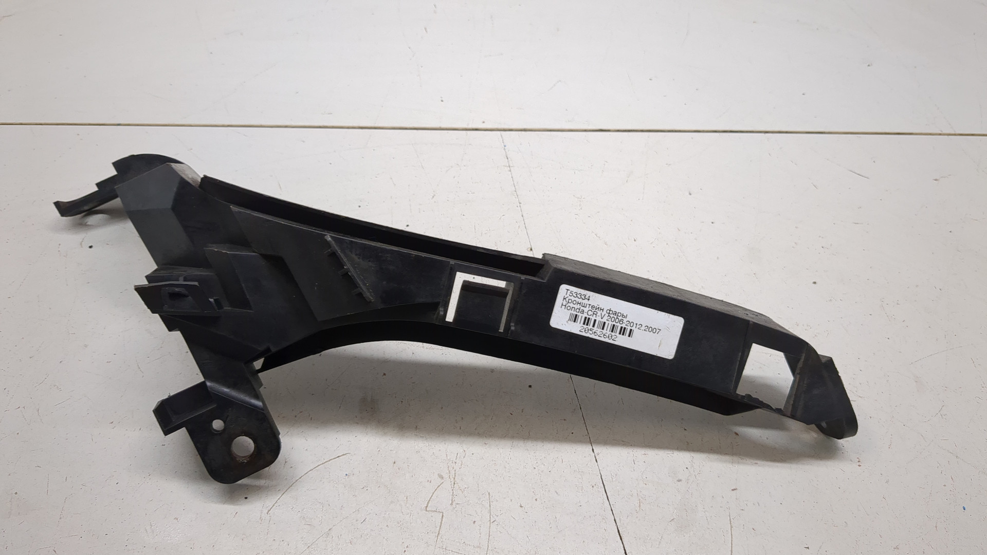 Кронштейн фар правый