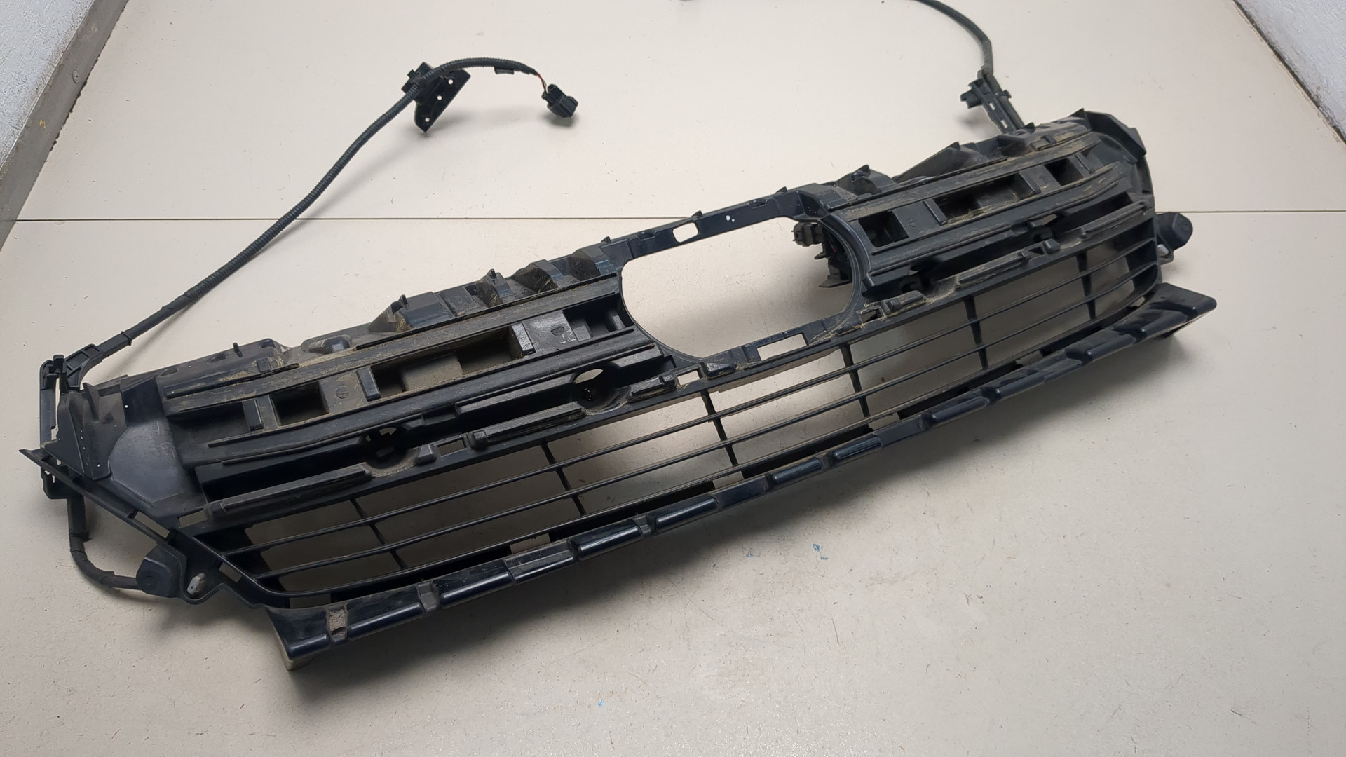 Кронштейн решетки радиатора