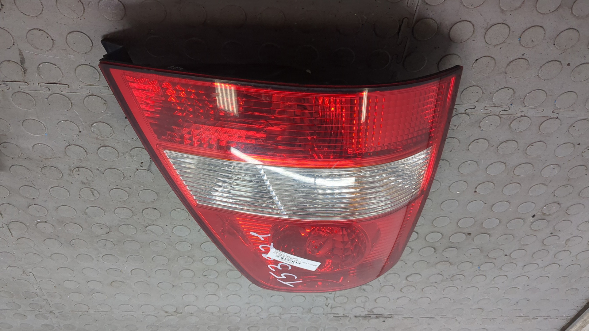 Фонарь задний левый