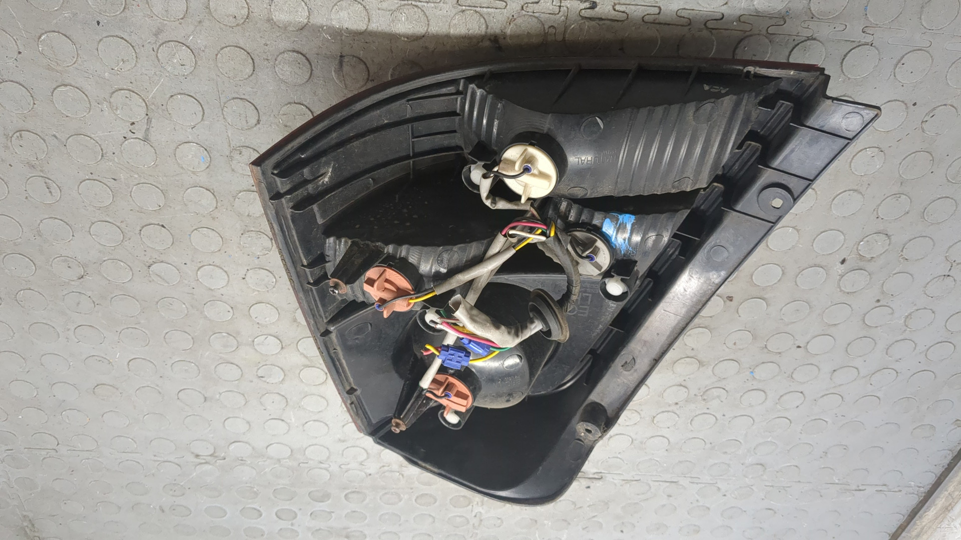 Фонарь задний левый