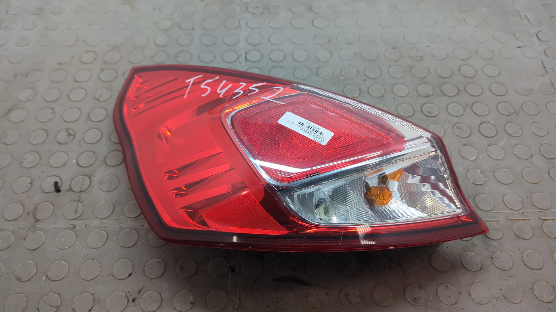 Фонарь задний левый