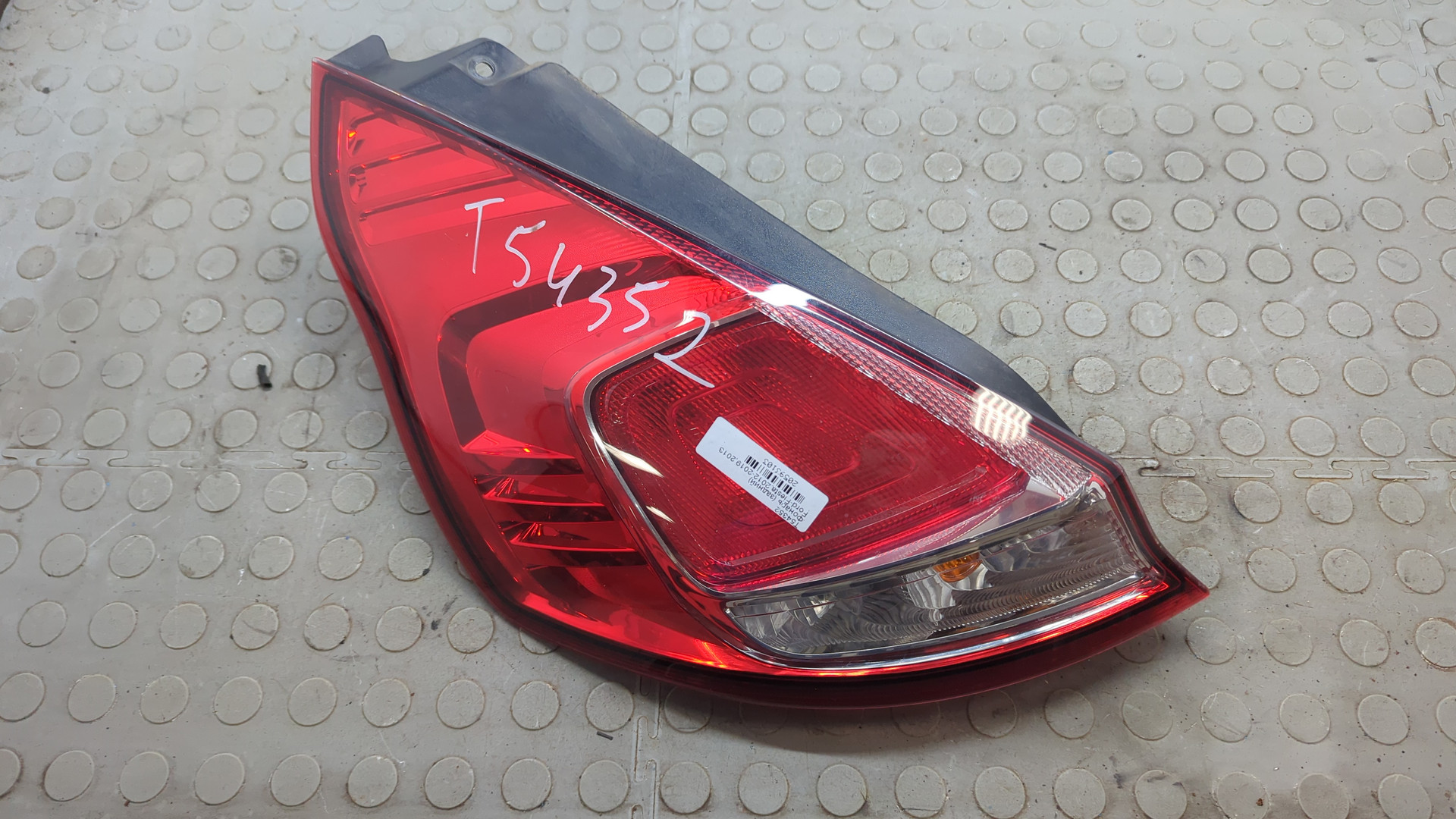 Фонарь задний левый