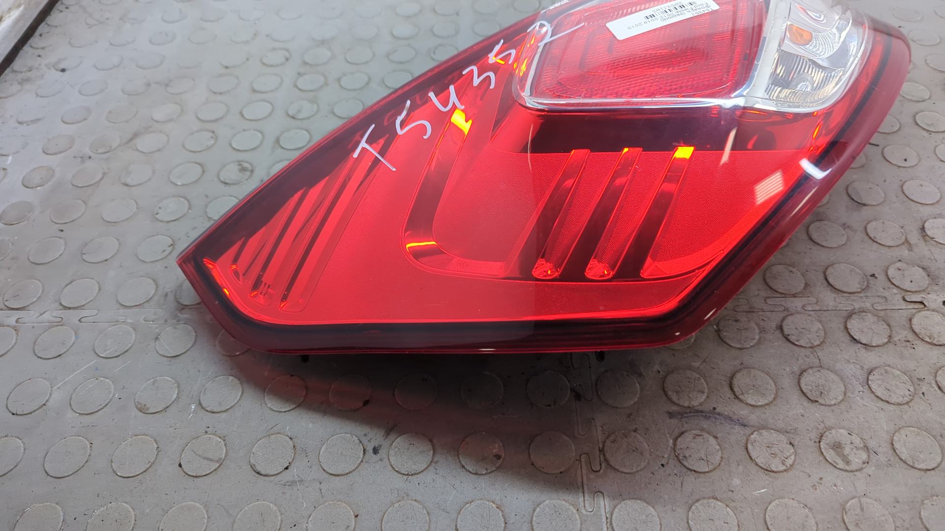 Фонарь задний левый