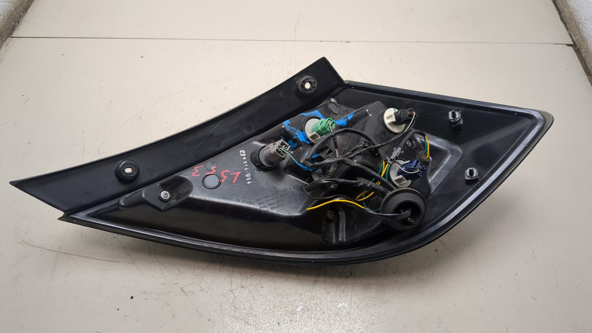 Фонарь задний левый