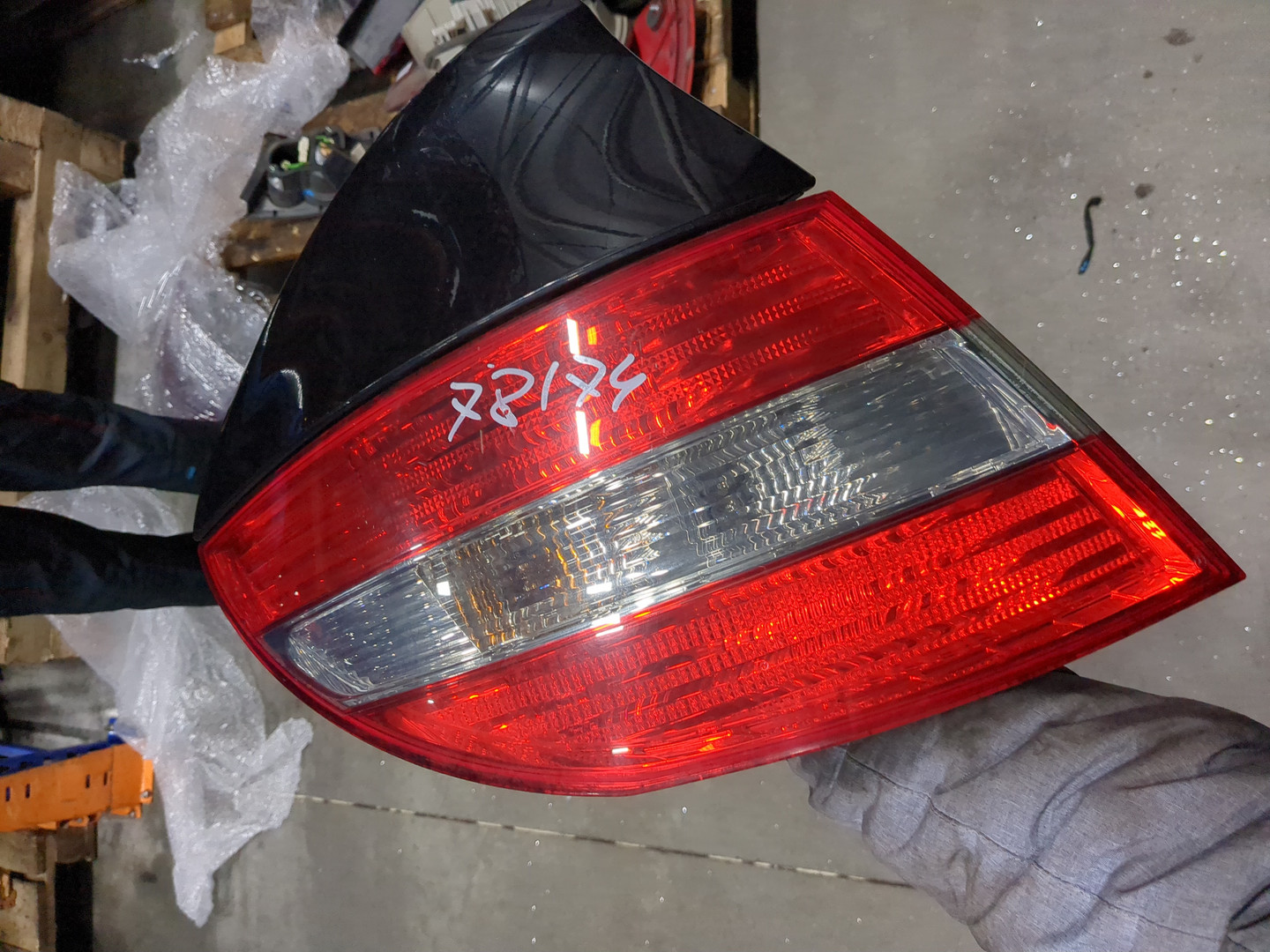 Фонарь задний левый