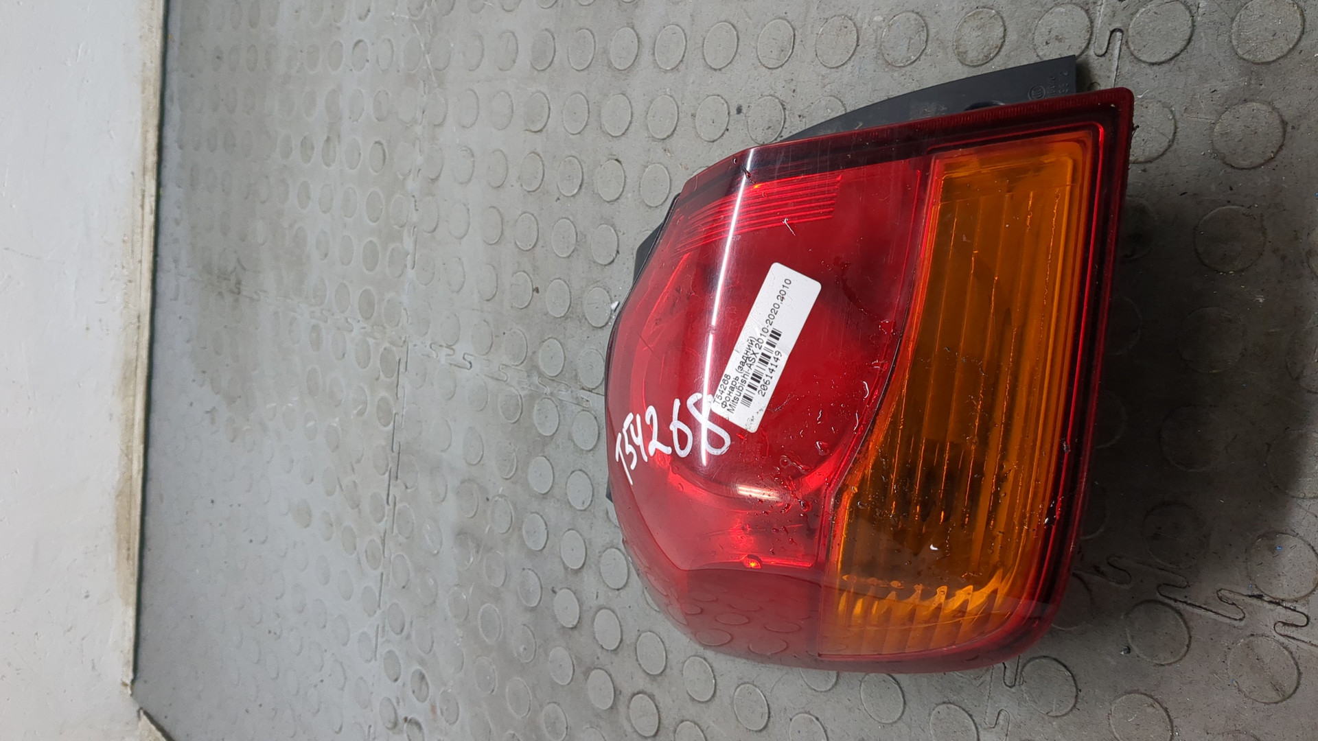 Фонарь задний левый