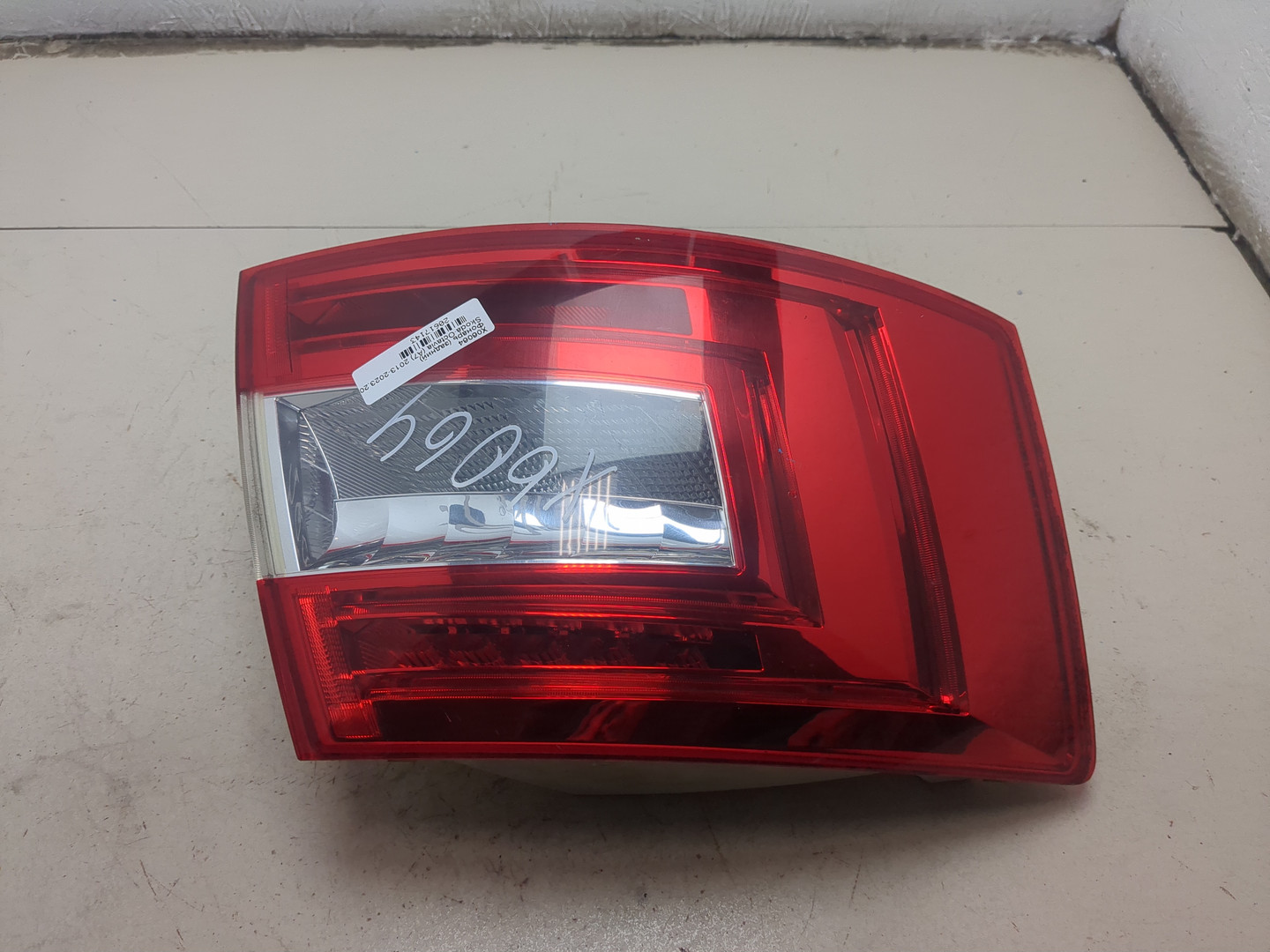 Фонарь задний левый