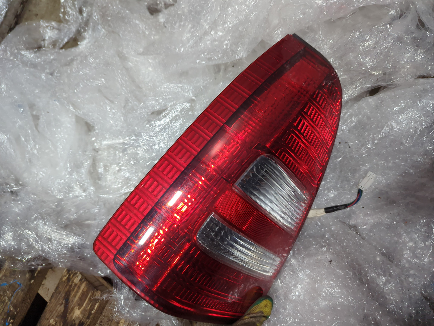 Фонарь задний левый