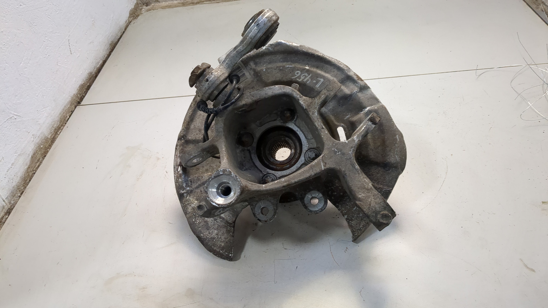 Кулак поворотный задний левый