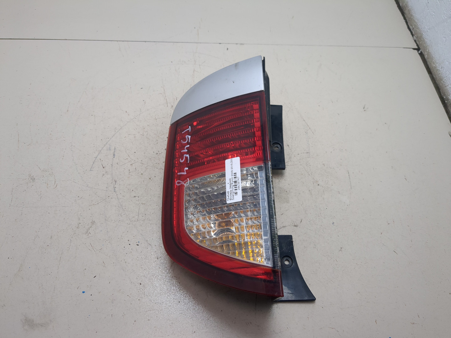 Фонарь задний левый