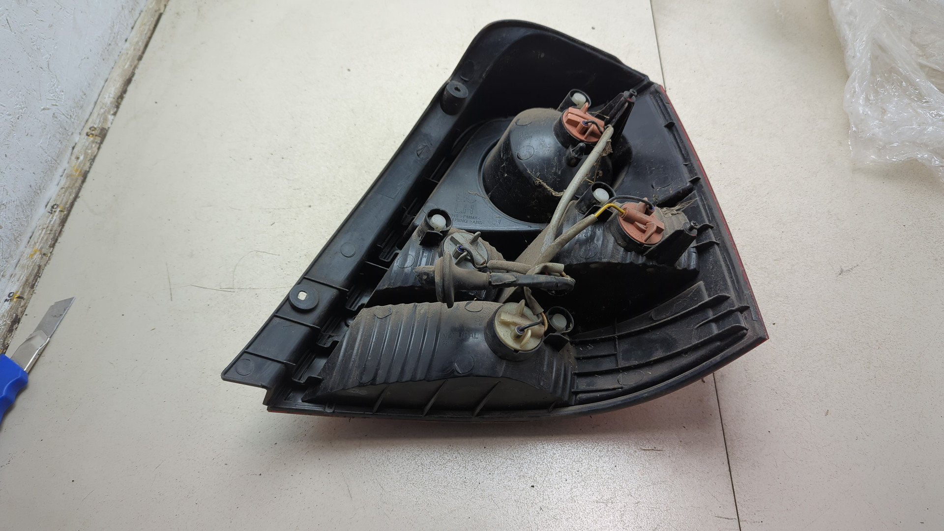 Фонарь задний левый