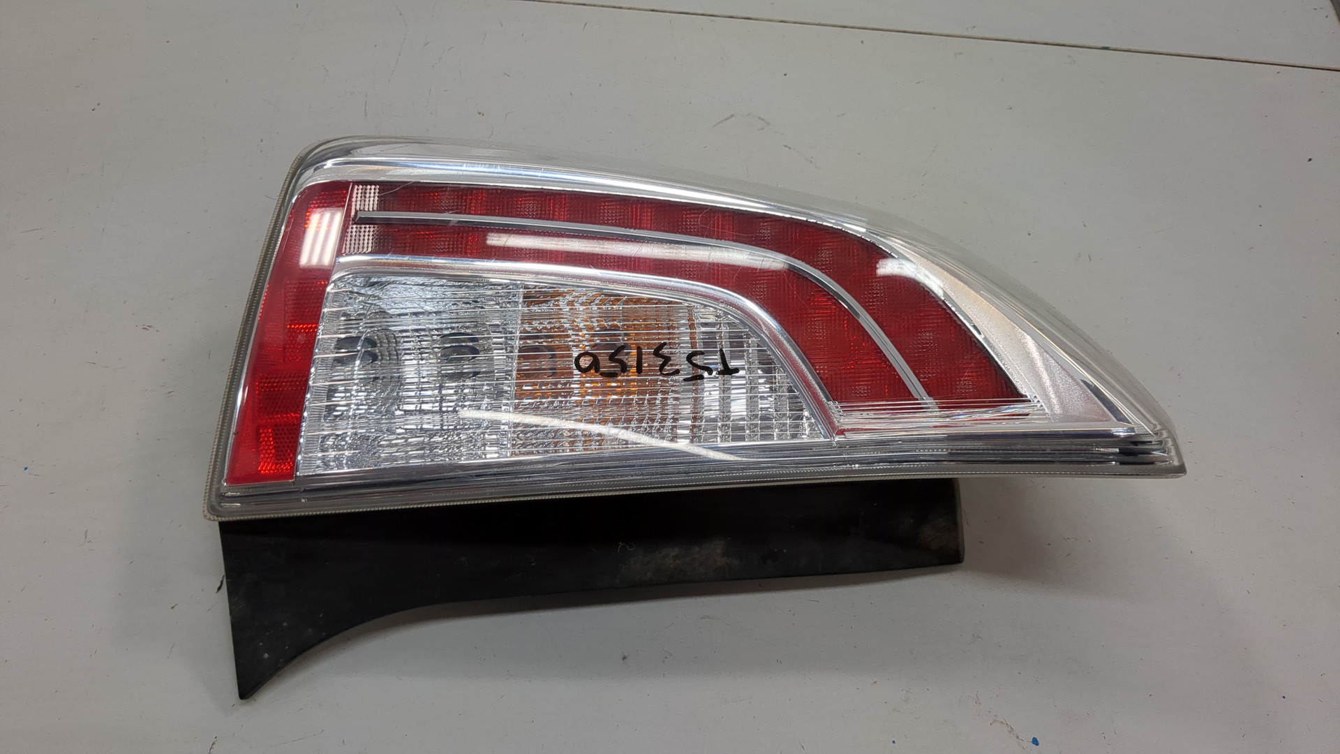 Фонарь задний левый