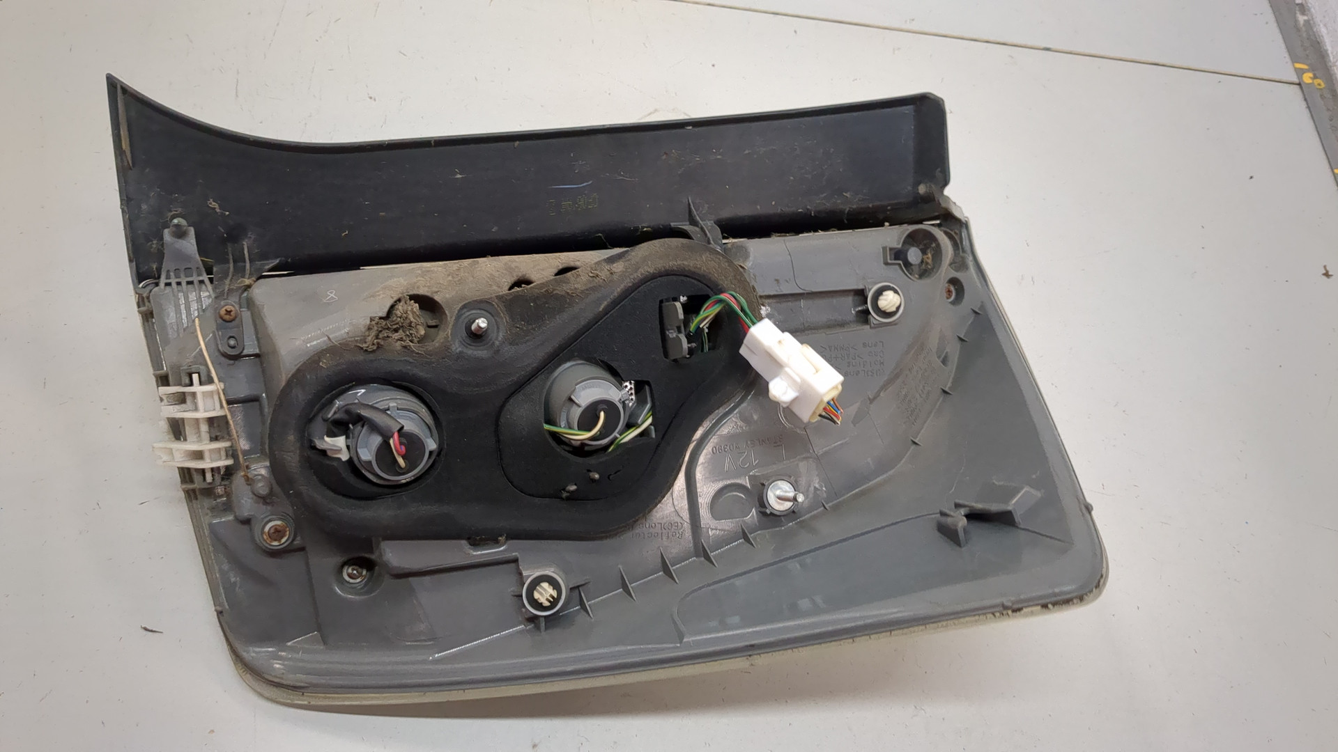 Фонарь задний левый