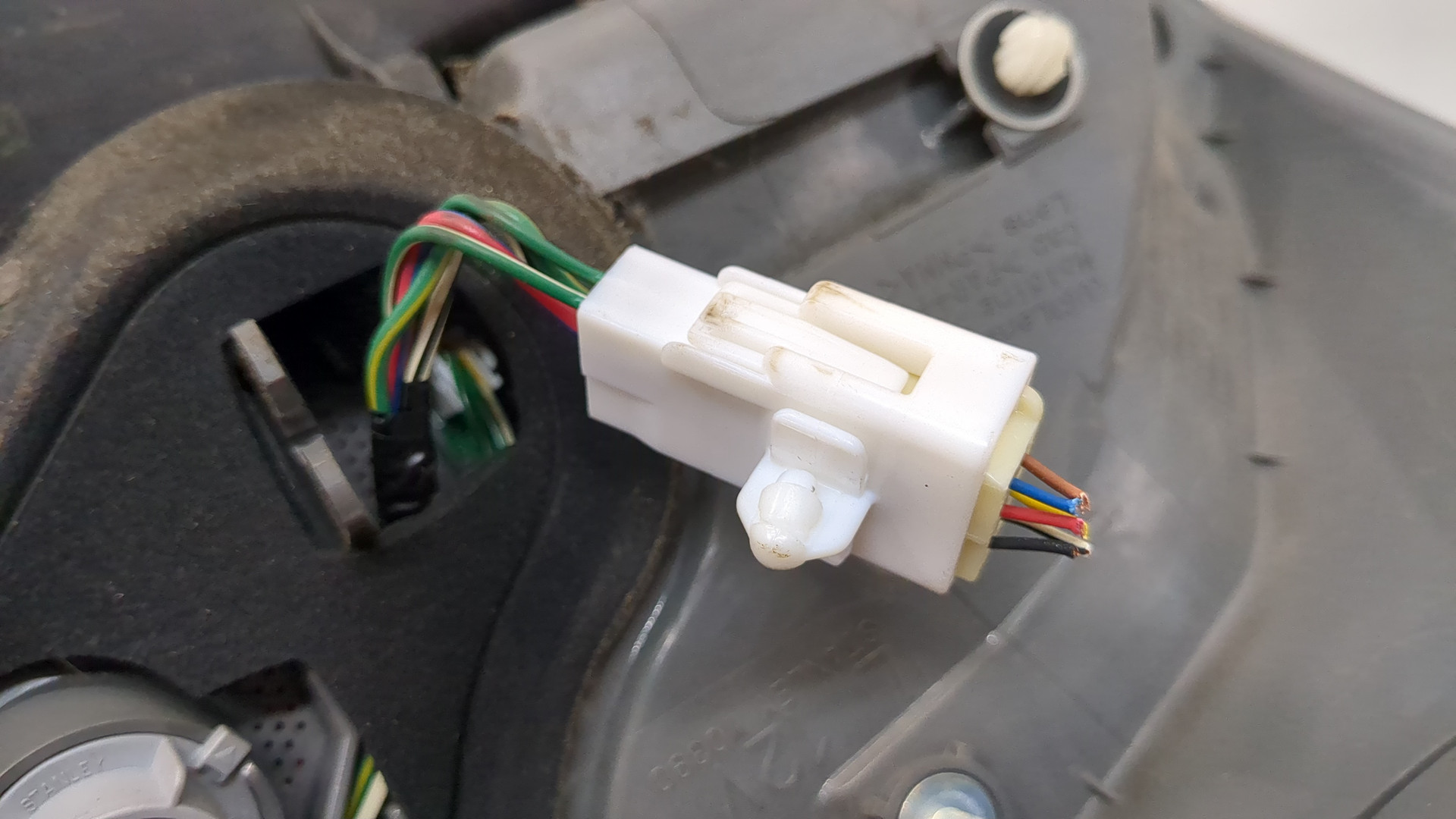 Фонарь задний левый