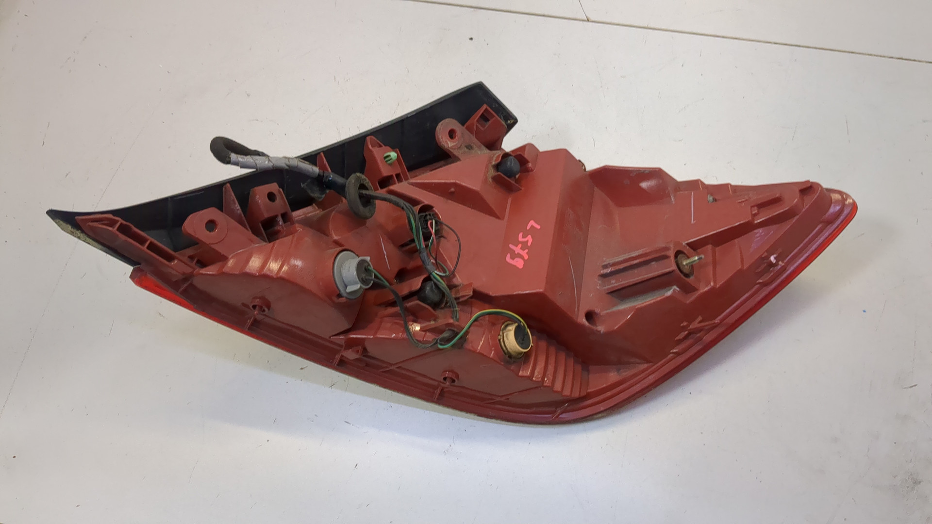 Фонарь задний левый