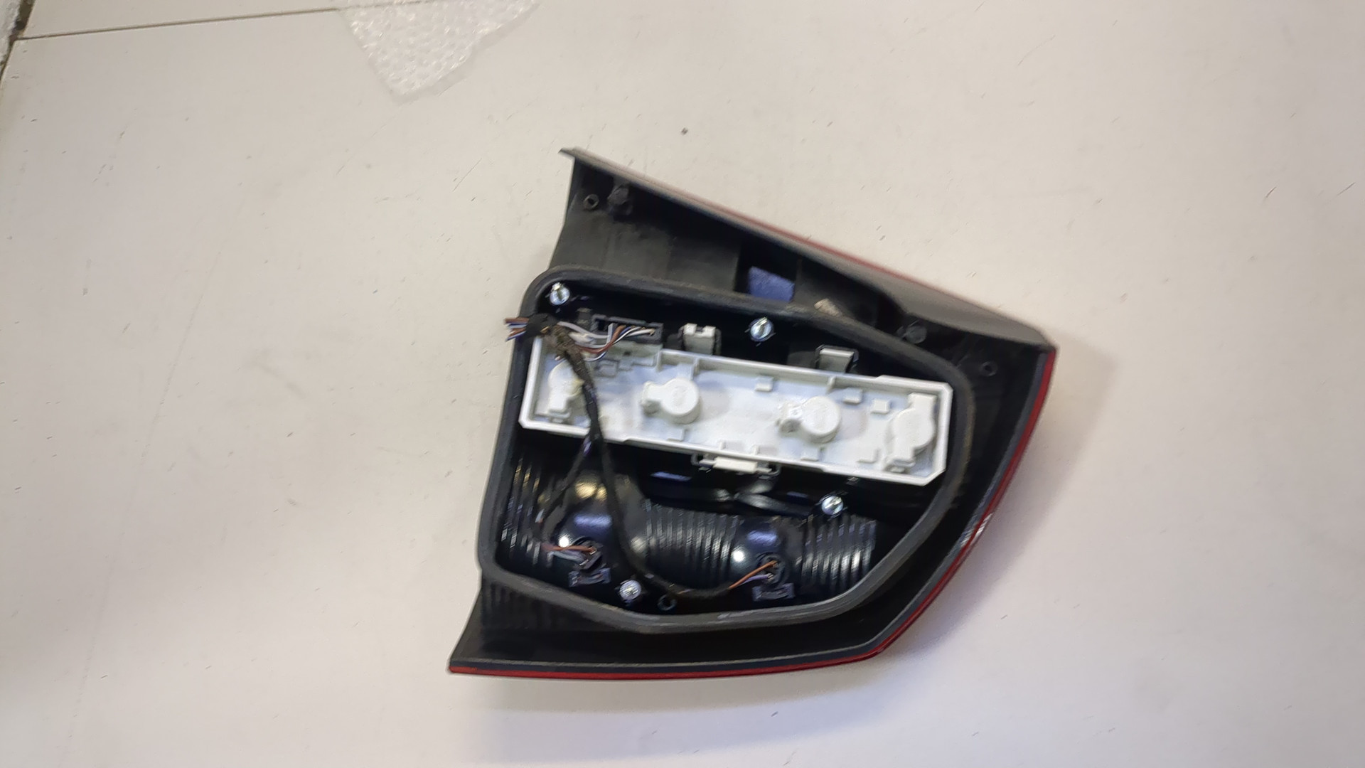 Фонарь задний левый