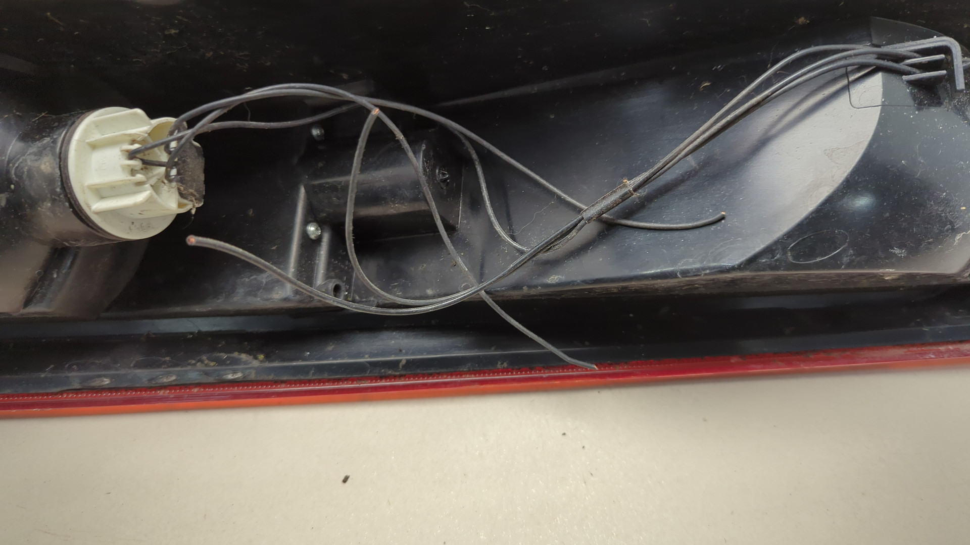 Фонарь задний левый