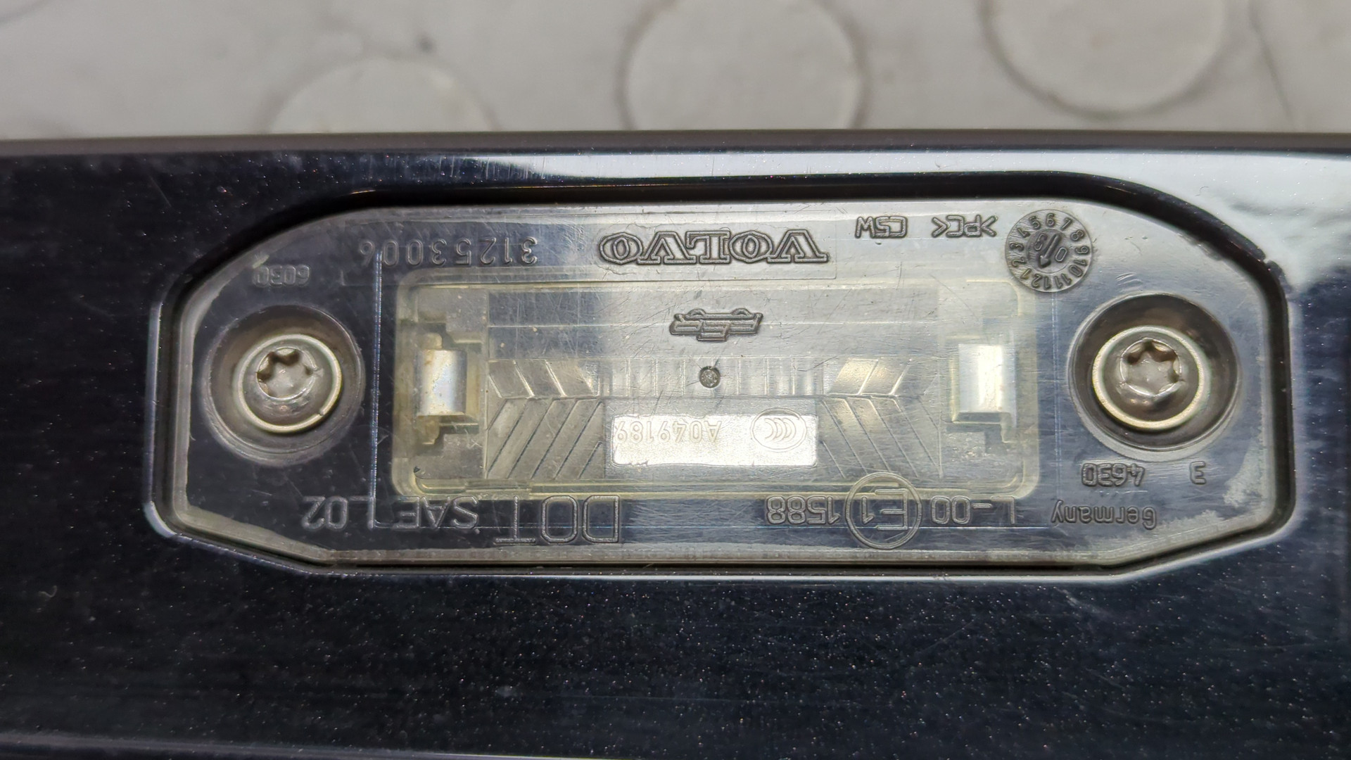 Фонарь подсветки номера