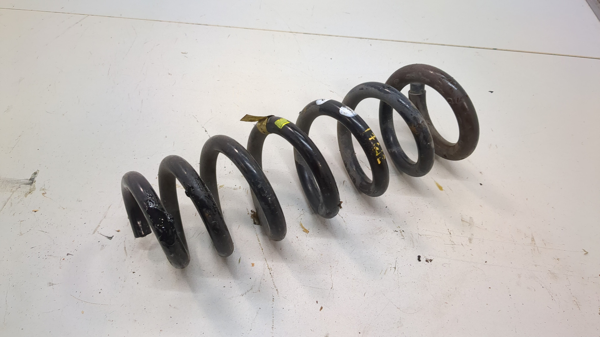 Пружина задняя