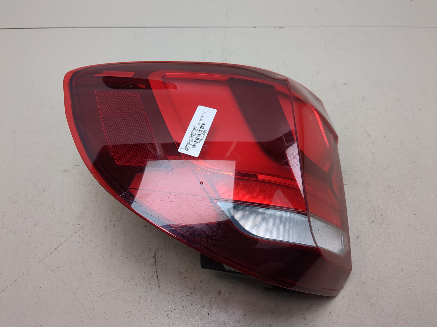 Фонарь задний левый