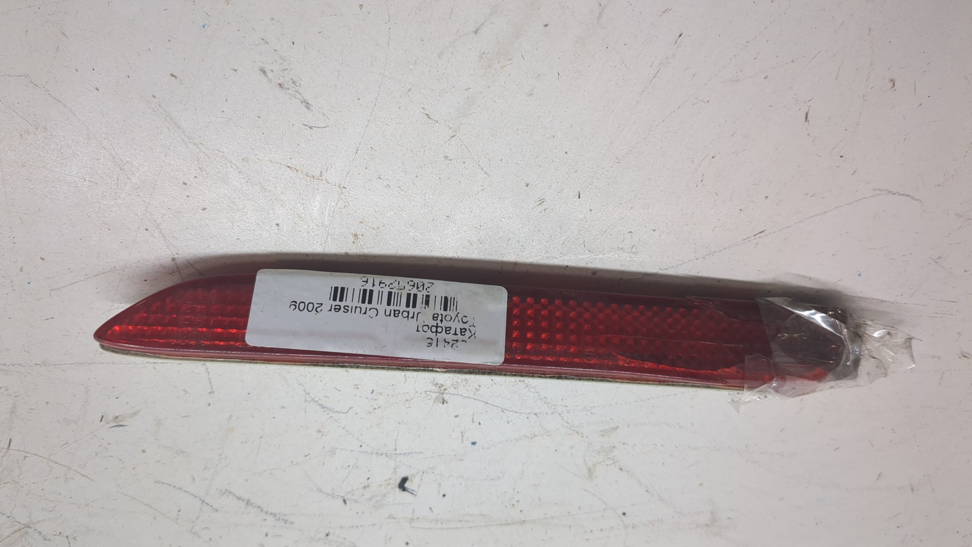 Отражатель в бампер задний левый