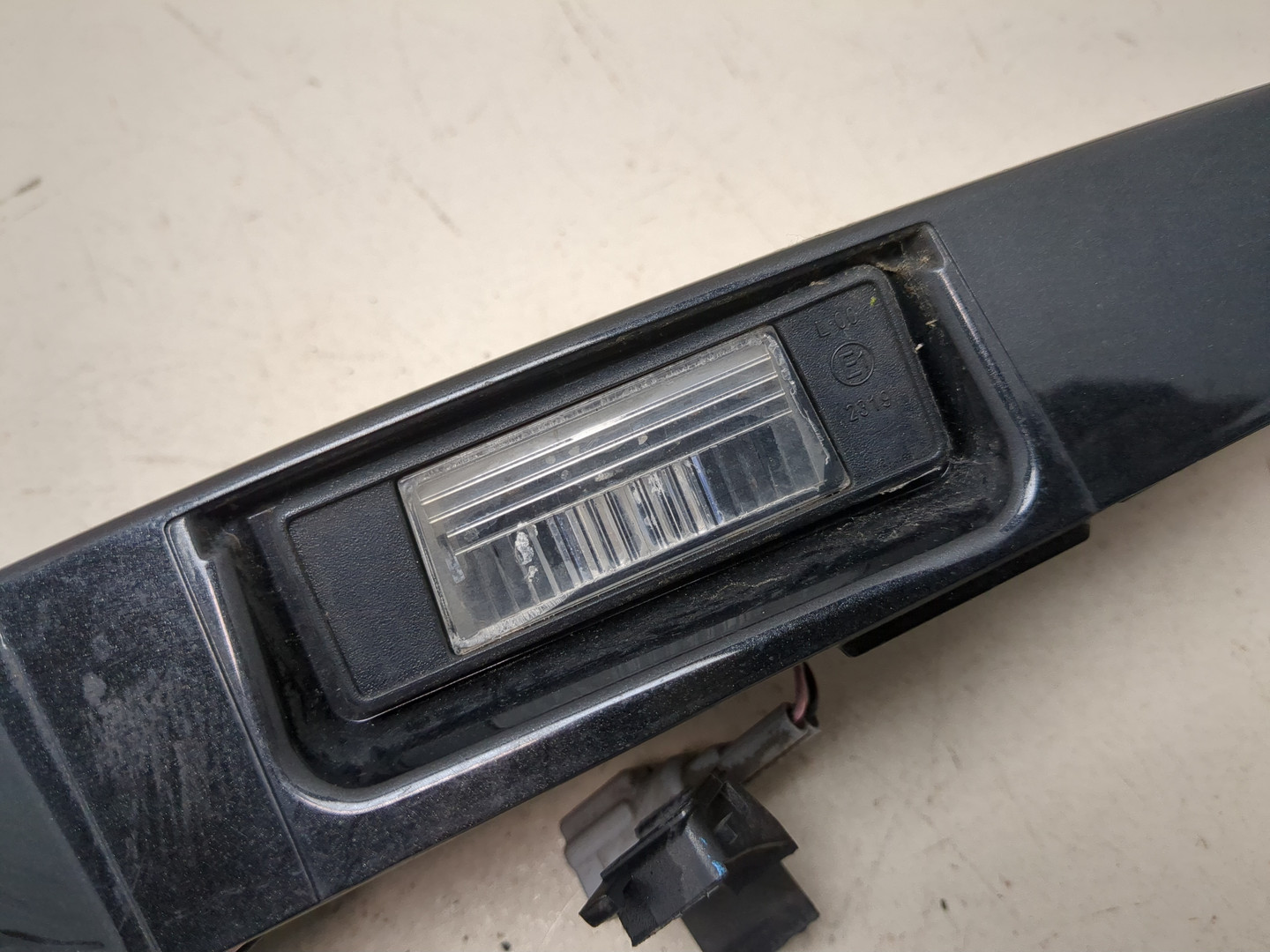 Фонарь подсветки номера