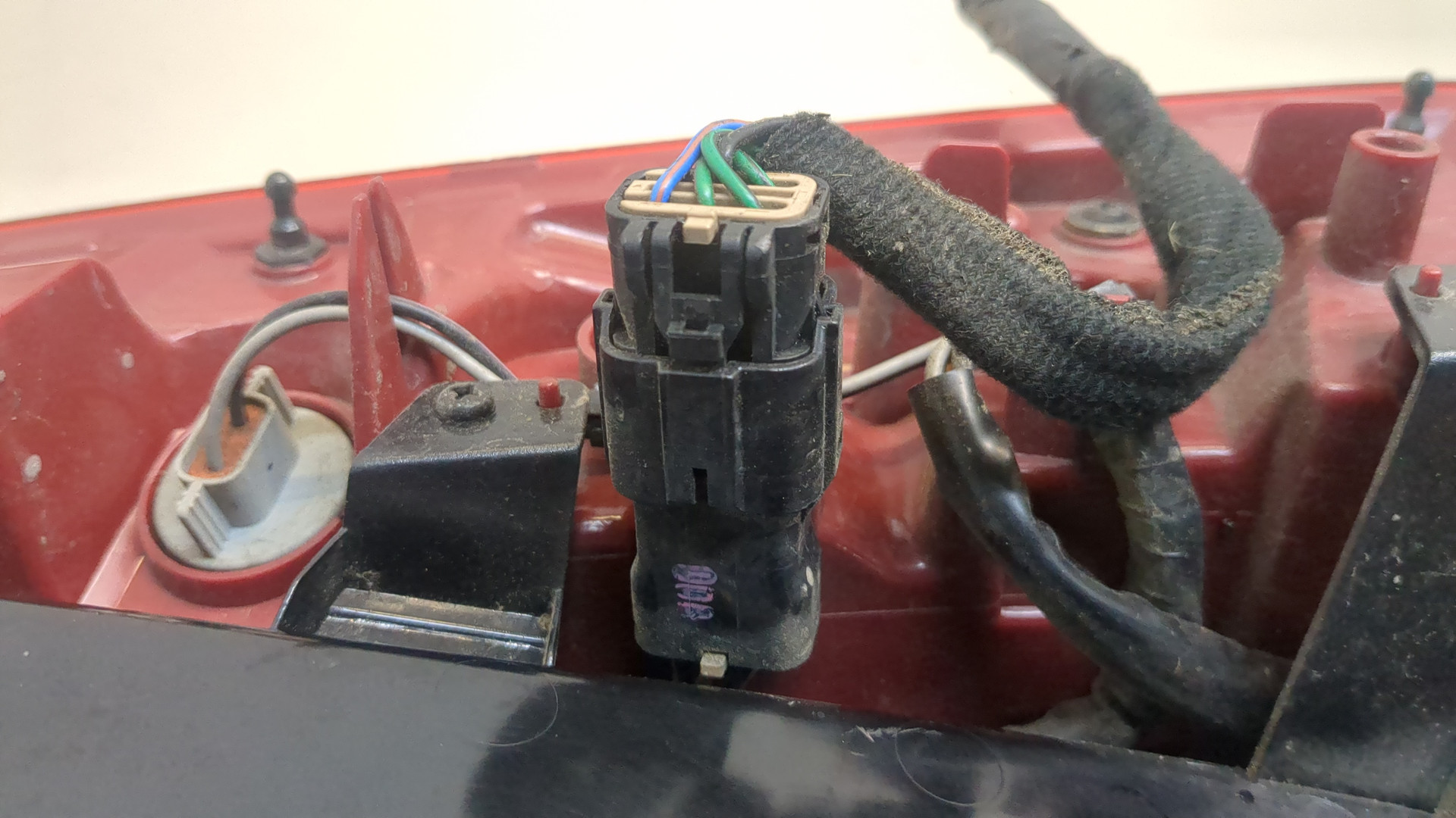 Фонарь задний левый