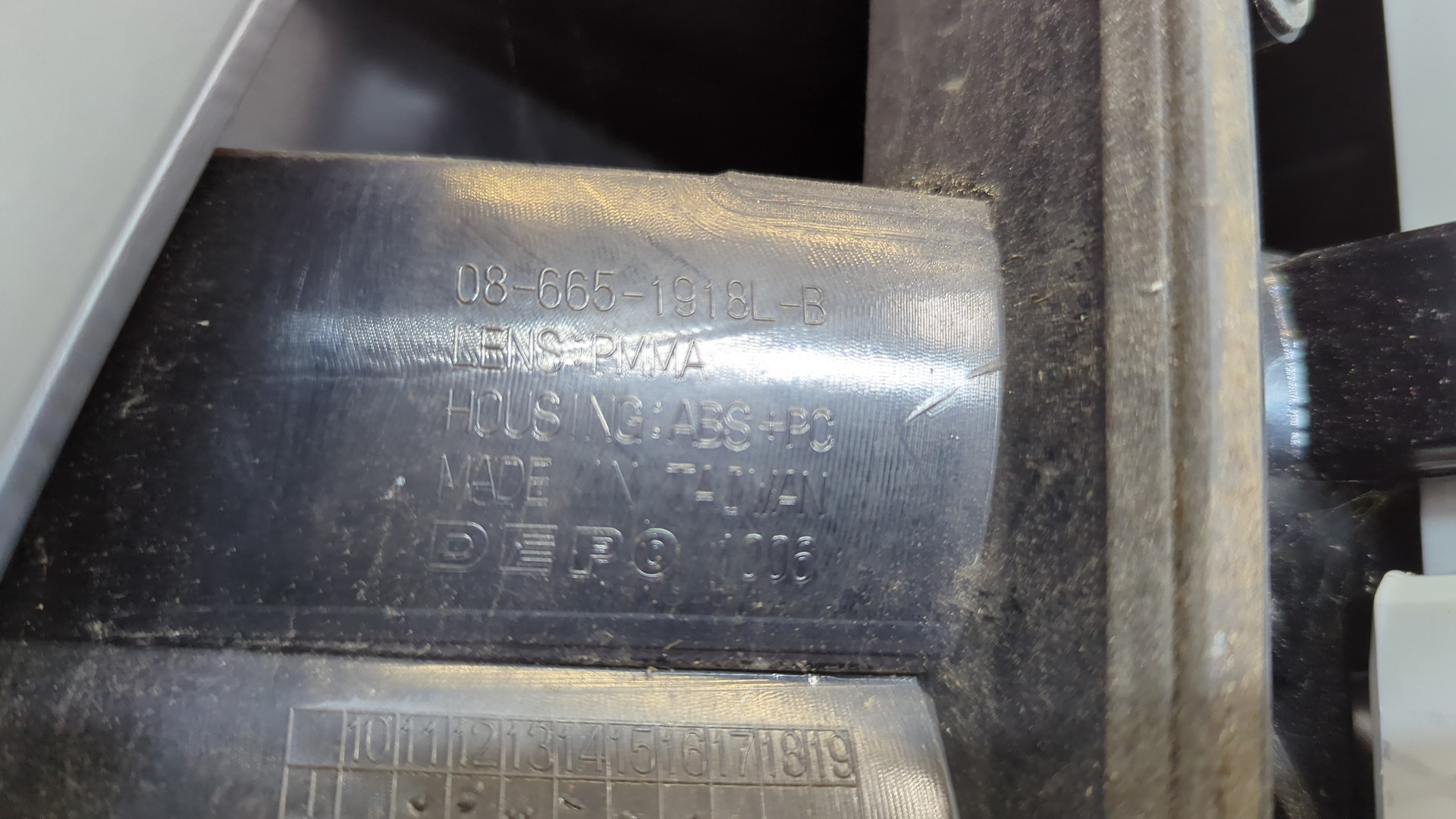 Фонарь задний левый